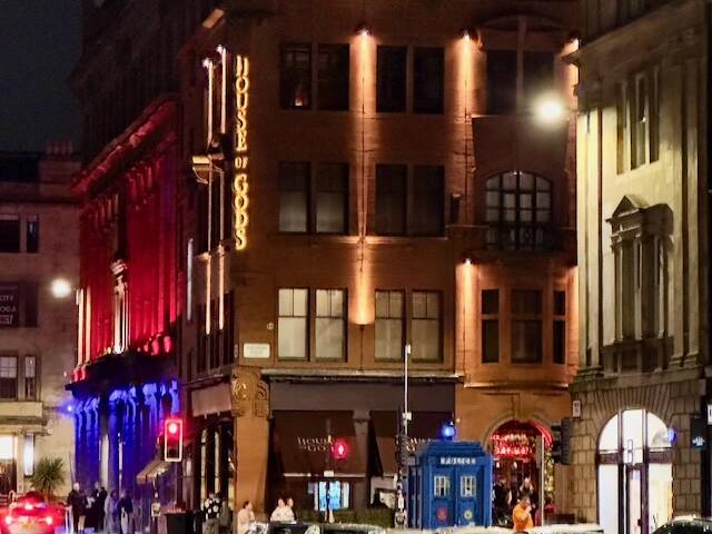 Image of bars and hotels on the corner of Glassford and Wilson Streets