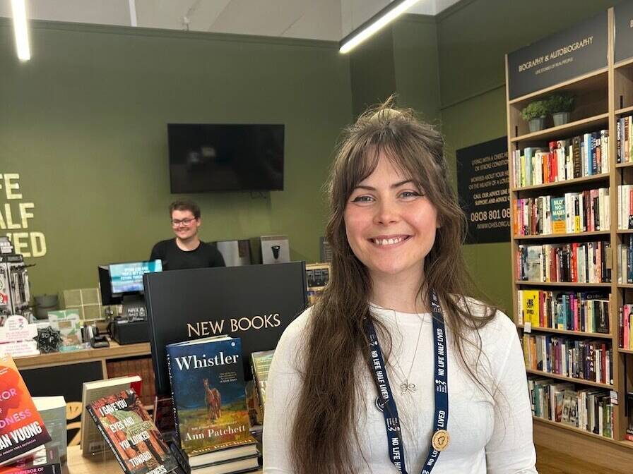 Interior of Chapter One bookshop with two members of staff
