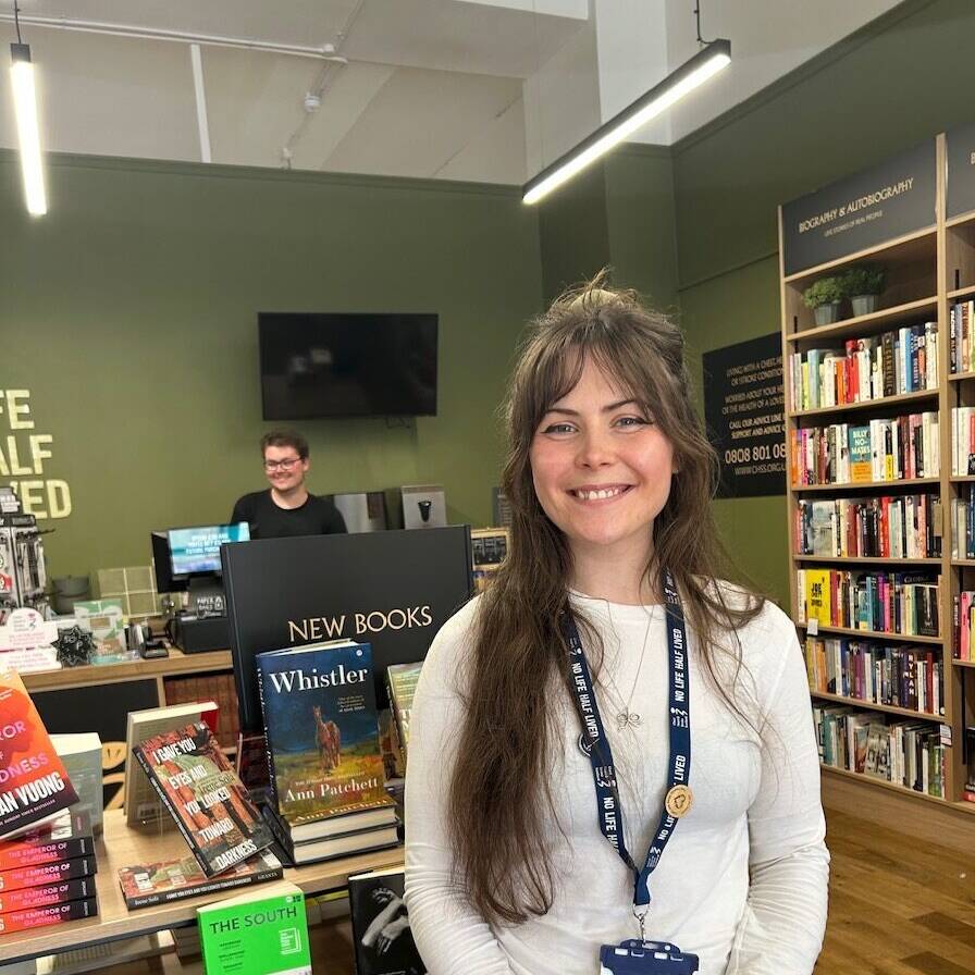 Interior of Chapter One bookshop with two members of staff