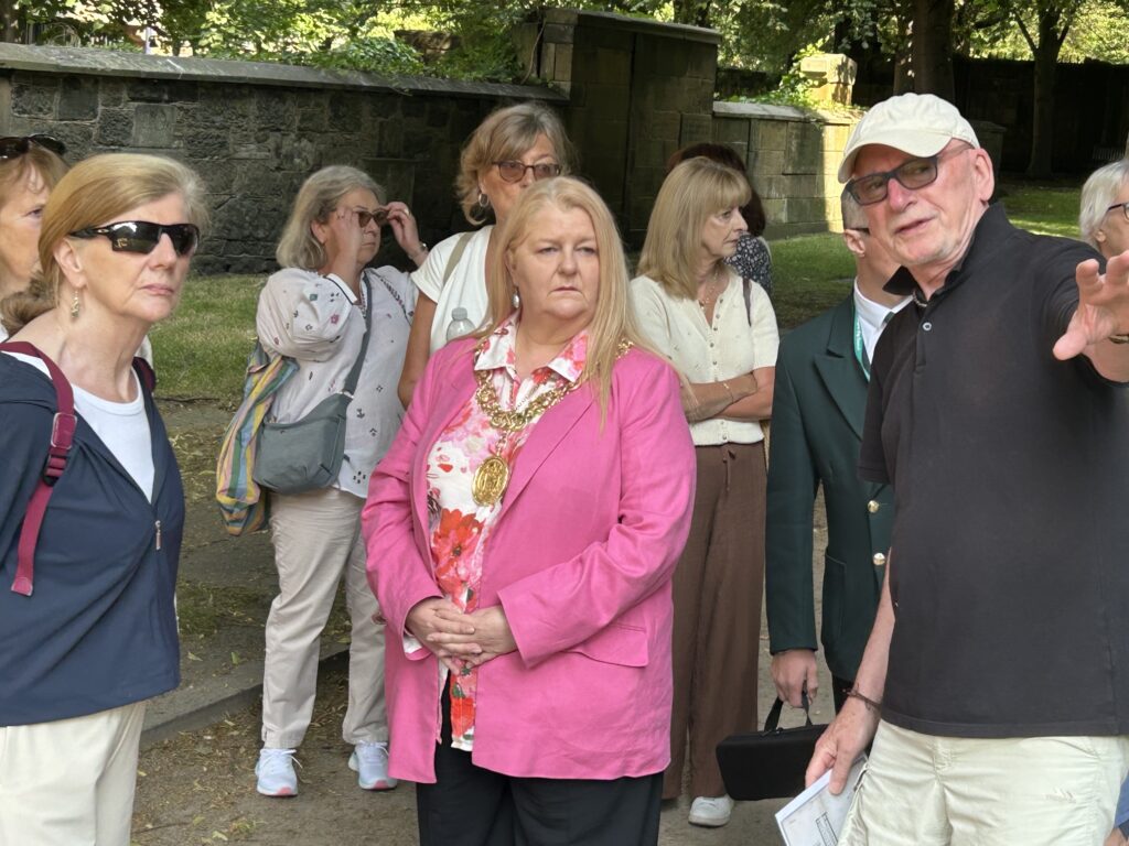 Lord Provost of Glasgow in Ramshorn Graveyeard with other visitors and tour guide